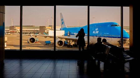 Amsterdam, Netherlands - March 11, 2016: KLM plane being loaded at Schiphol Airportのeditorial素材