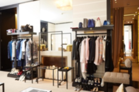 The blurred luxury clothing boutique interior backgroundの写真素材