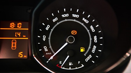 Car Dashboard. Close up image of illuminated car dashboard.