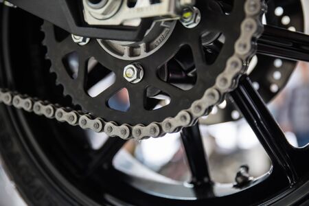 Modern motorcycle drive chain closeup. Shallow dofの写真素材