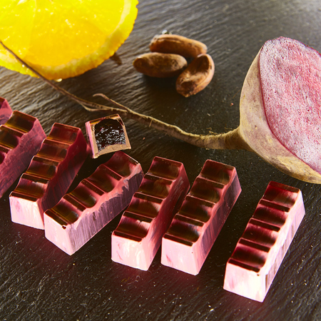 Set of chocolate candie with beetroot and orange, chocolate collection