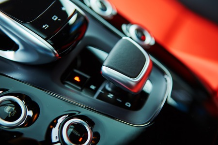 Detail of modern car interior, gear stick, automatic transmission in expensive carの写真素材