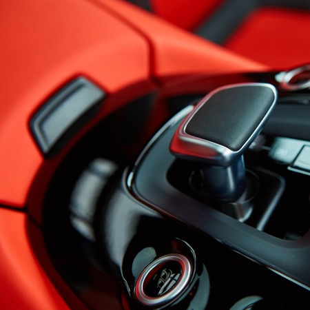 Detail of modern car interior, gear stick, automatic transmission in expensive carの写真素材