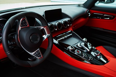 Luxury car Interior. Steering wheel and dashboardの写真素材
