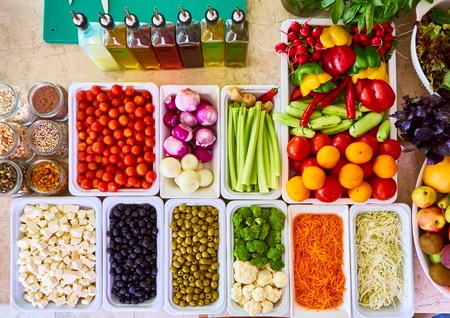 Salad Bar Fresh Vegetables sliced Top view Tomato Carrot Celery Cucumber Cherry tomato Sweet pepper.の写真素材