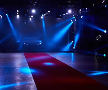 Close up of a new car hidden under cover.の写真素材
