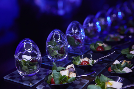 Beautifully decorated catering banquet table with different food snacksの写真素材