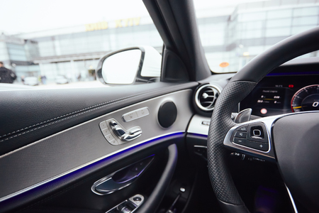 Control buttons on steering wheel. Car interior.の写真素材