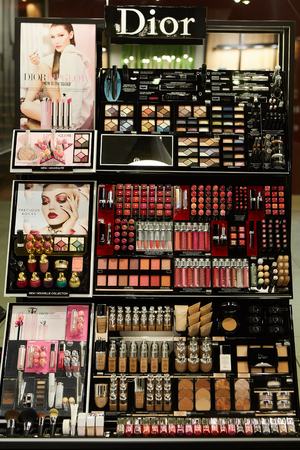 Amsterdam Schiphol Airport, Netherlands - March 27, 2018: Various Dior cosmetic store. Cosmetics are the most accessible product, with counters in upmarket department stores across the world.のeditorial素材