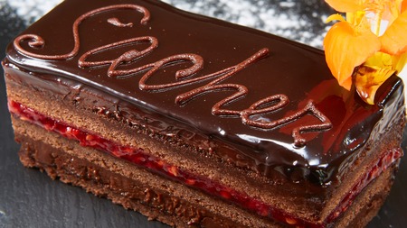 A piece of Sacher cake. Shallow dof.の写真素材
