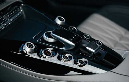 Detail of modern car interior, gear stick, automatic transmission in expensive carの写真素材