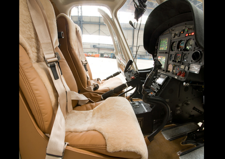 Luxury interior in bright colors of genuine leather in the business jetの写真素材
