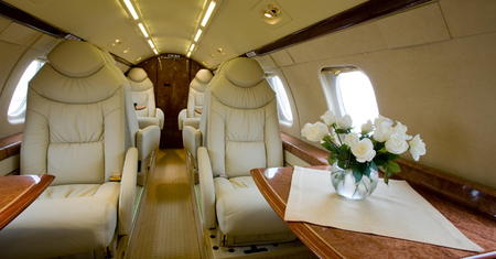 Luxury interior in bright colors of genuine leather in the business jetの写真素材