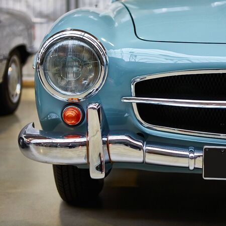 Detail of classic car. Close-up of headlight