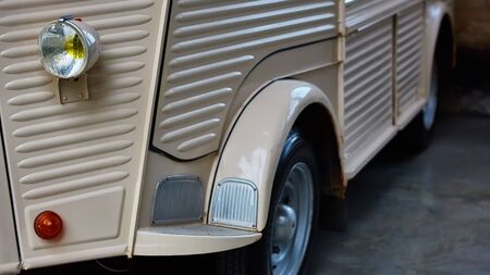 Detail of classic car. Close-up of headlight