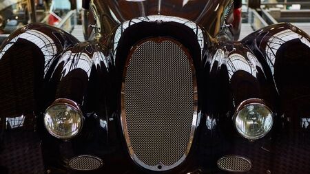 Detail of classic car. Close-up of headlight
