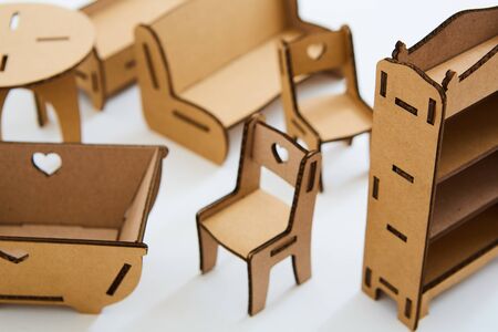 Dollhouse furniture from cardboard. Concept of Circular economy.の写真素材