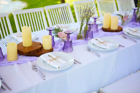Table set for wedding or another catered event dinner. Shallow dofの写真素材