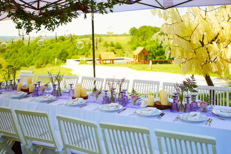 Table set for wedding or another catered event dinner. Shallow dofの写真素材