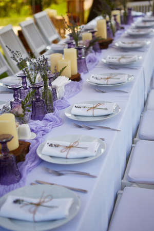 Table set for wedding or another catered event dinner. Shallow dofの写真素材