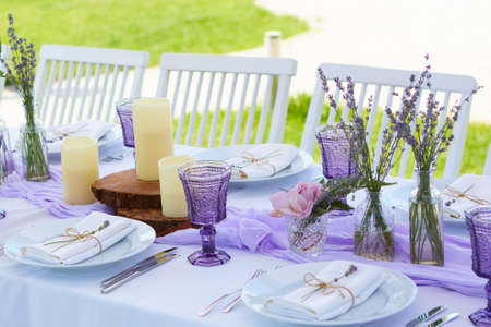 Table set for wedding or another catered event dinner. Shallow dofの写真素材