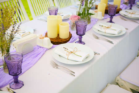 Table set for wedding or another catered event dinner. Shallow dofの写真素材