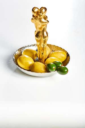 Bowl of brine cured green olives. Shallow dof.の写真素材