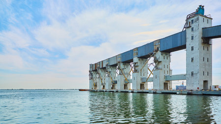 Cargo terminal for loading grain cargo by shore cranes.の写真素材