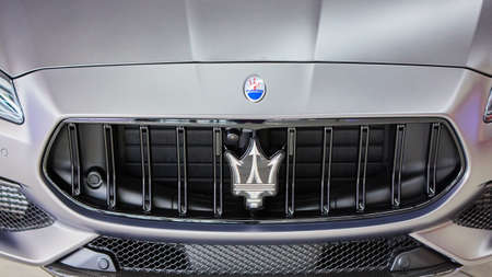 Ukraine, Kyiv - October 10, 2021: Close up logo Maserati. Presentation of new models Maserati