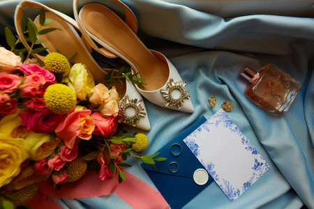 Wedding rings and wedding invitation. Shallow dofの写真素材