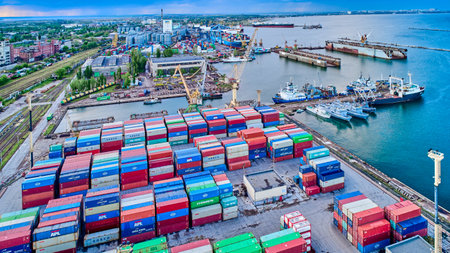 Odessa, Ukraine - May 19, 2021: Freight containers in the port terminal. Containers labeled...