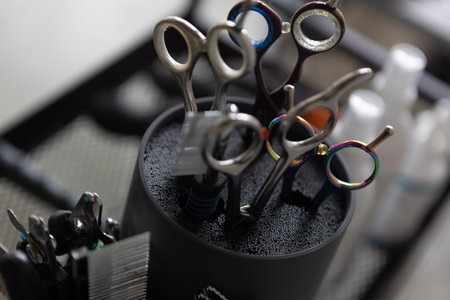 Set of professional instruments for grooming animals. Clippers, brushes, combs, scissors. Pet care concept. Tools, equipment for dogs and cats. Shallow DOFの写真素材