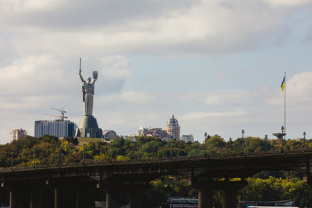 View of the big city on the hills over wide river. View at Paton bridge. Kyiv. Ukraineの写真素材