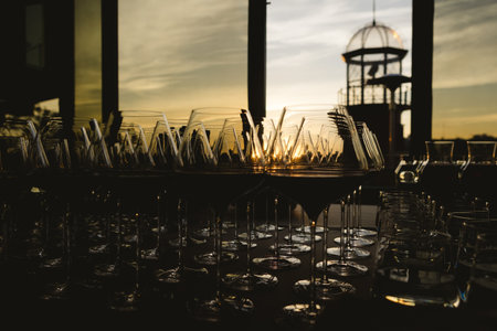 Glasses with white and red wine. Catering services. Glasses with wine in row background at...
