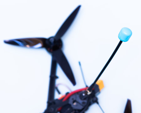 FPV drone in production on white background.の写真素材