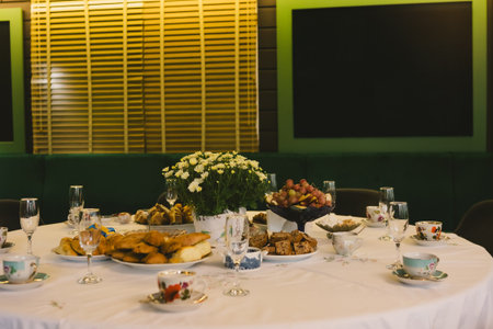A beautiful table set for an autumn celebration.の写真素材