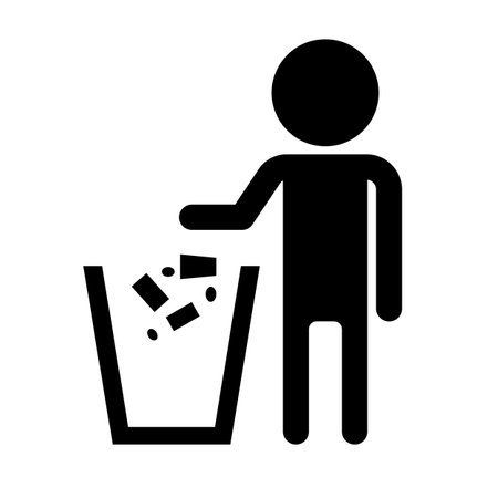People throwing trash in trash can silhouette icon. Editable vector.のイラスト素材