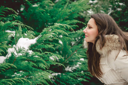 Girl looking at treeの写真素材