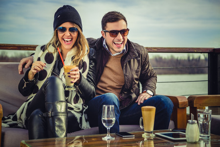 Man and woman laughingの写真素材