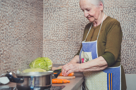 Grandmother making saladの写真素材