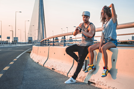 Worried couple looking at the timeの写真素材