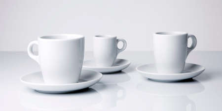 White coffee cups on white backgroundの写真素材