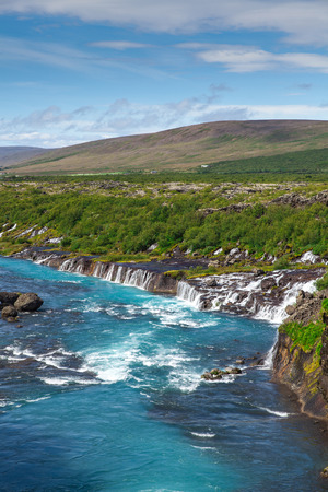 Iceland, Hraunfossar waterfalls in a beautiful sunny summer dayの写真素材