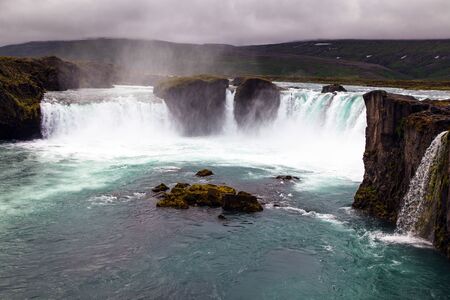 Iceland, Godafoss waterfall in a rainy summer dayの写真素材