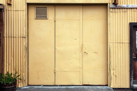 Weathered metal home walls vintage and rustedの写真素材