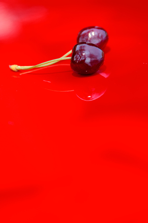 Close up of fresh cherry berries photographed in daylight conditions