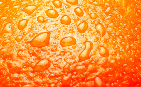 Ripe Orange Background texture with waterdrops macroの写真素材