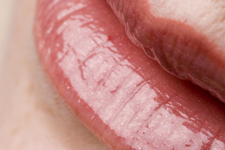 Female lips closeup - macro studio shot