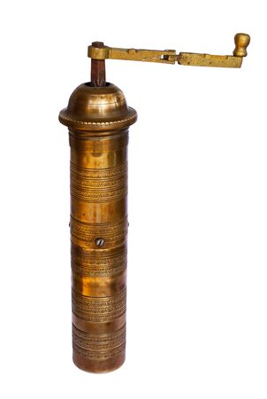 Oriental vintage coffee grinder isolated on whiteの写真素材