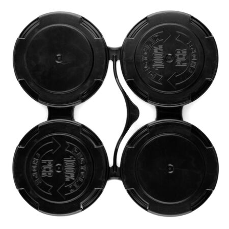 Set of four connected plastic lids for cup packageの写真素材